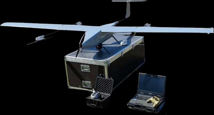 BSP G1B-VTOL nad skrzynią transportową z naziemną stacją sterowania